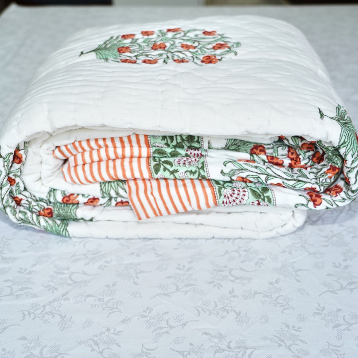 Orange Floral Symphony Reversible Hand Block Printed Cotton Quilt