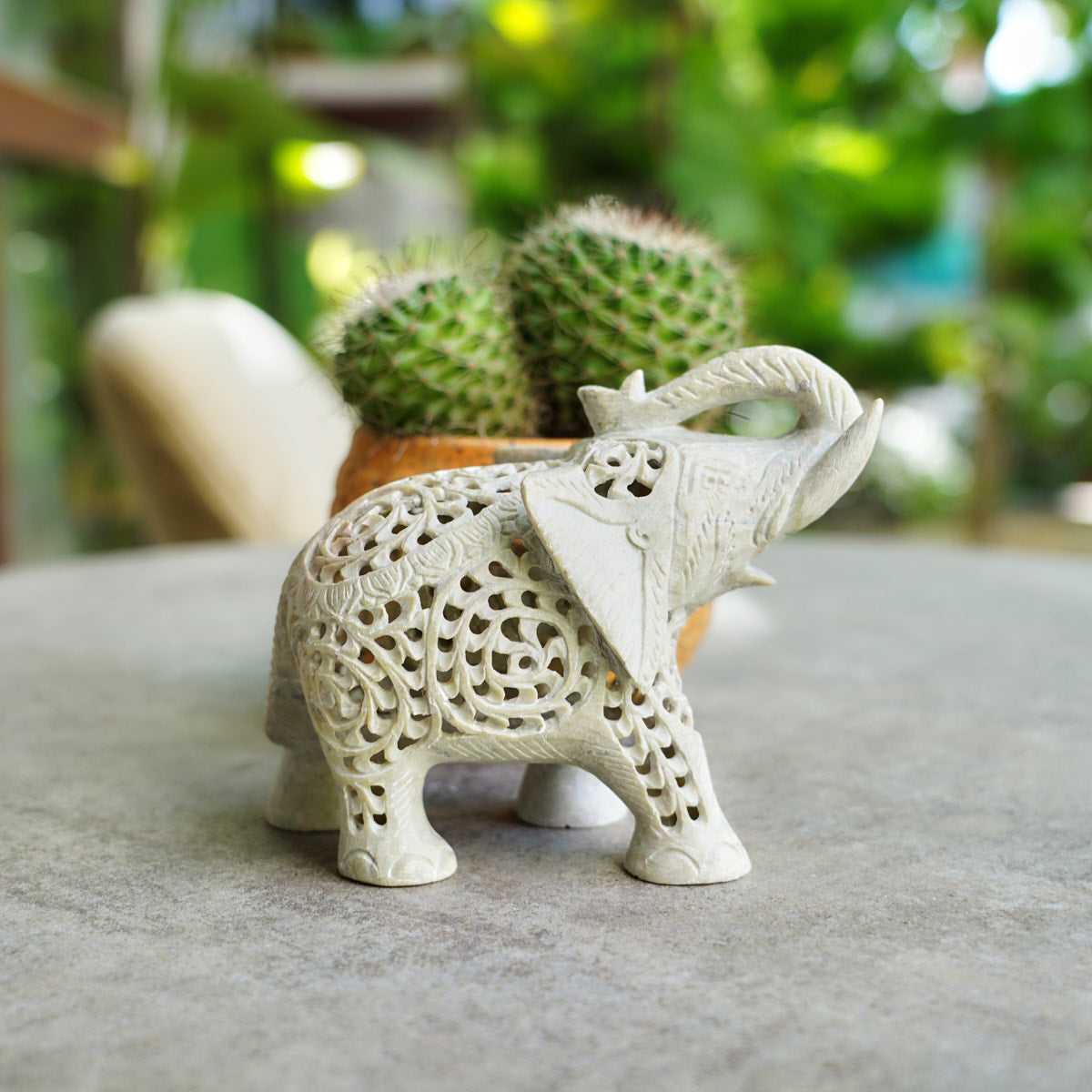 Stone Elephant Trunk Up Sculpture with Intricate Jali Carving