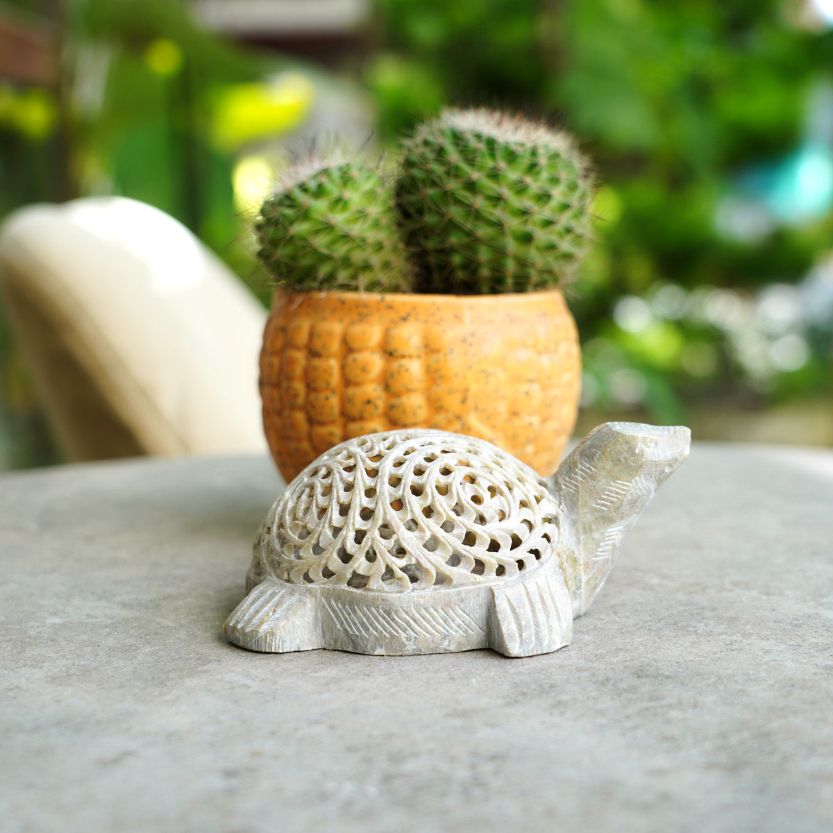 Stone Turtle Sculpture with Intricate Jali Carving