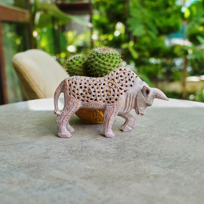 Stone Bull Sculpture with Intricate Jali Carving