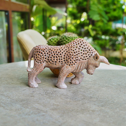 Stone Bull Sculpture with Intricate Jali Carving