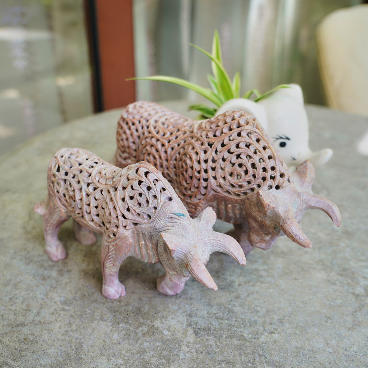 Stone Bull Sculpture with Intricate Jali Carving