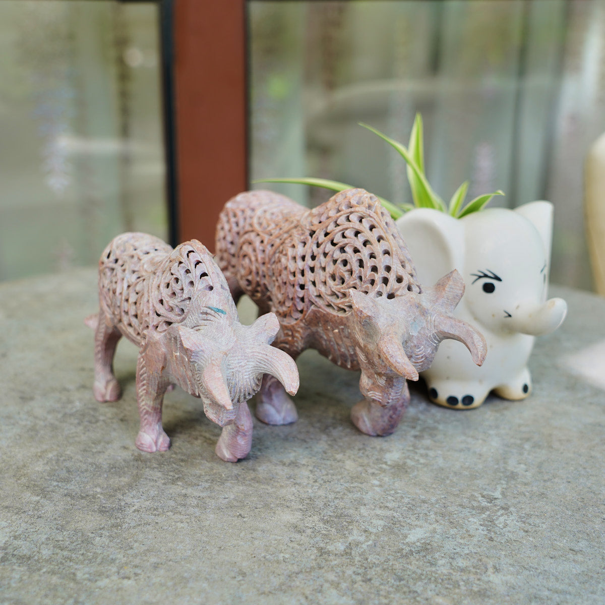 Stone Bull Sculpture with Intricate Jali Carving