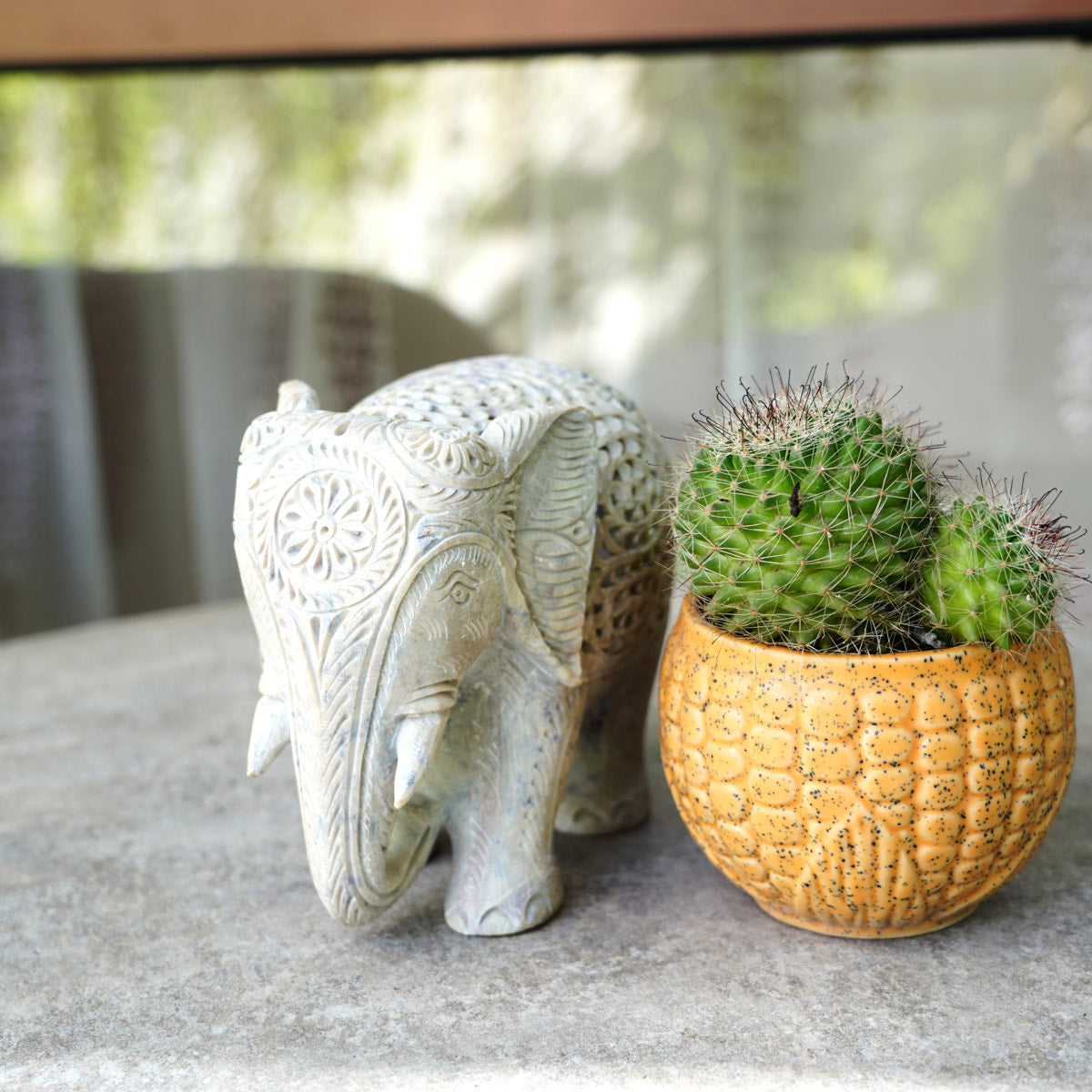 Stone Elephant Sculpture with Intricate Jali Carving