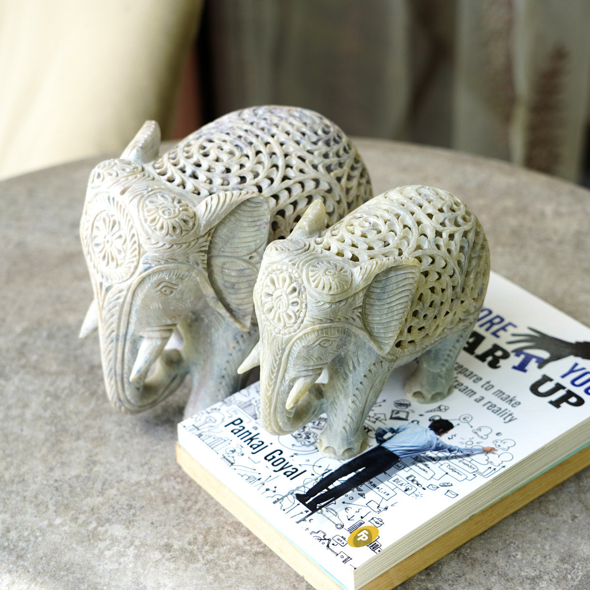Stone Elephant Sculpture with Intricate Jali Carving