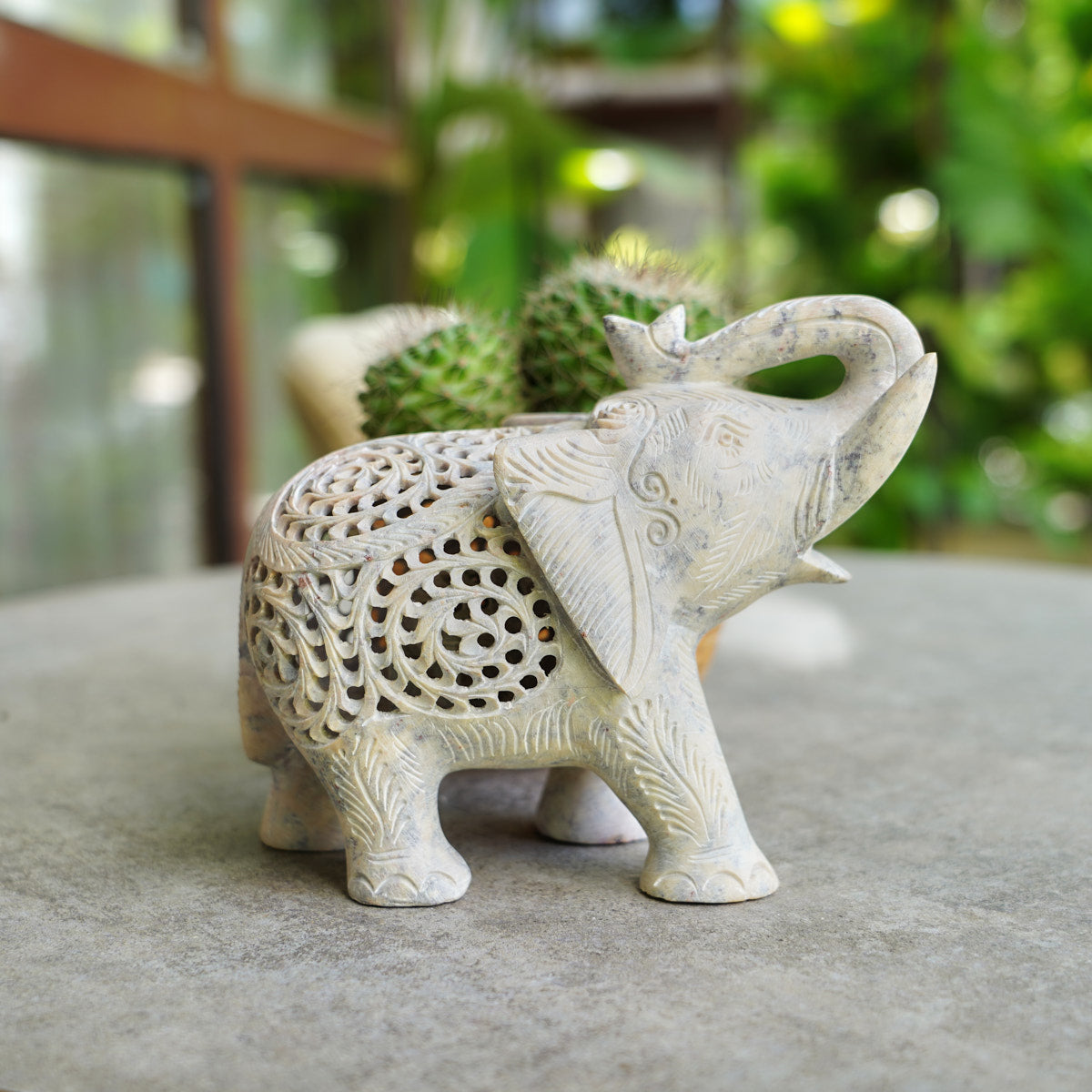 Stone Elephant Trunk Up Sculpture with Intricate Jali Carving