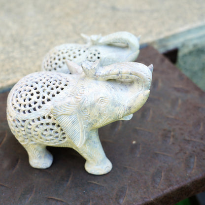 Stone Elephant Trunk Up Sculpture with Intricate Jali Carving