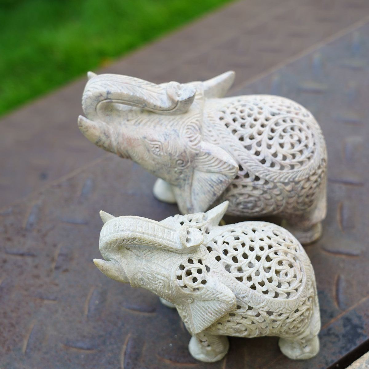 Stone Elephant Trunk Up Sculpture with Intricate Jali Carving