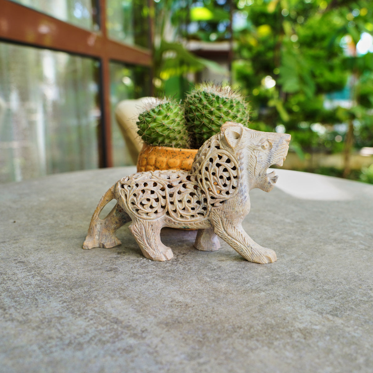 Stone Lion Sculpture with Intricate Jali Carving