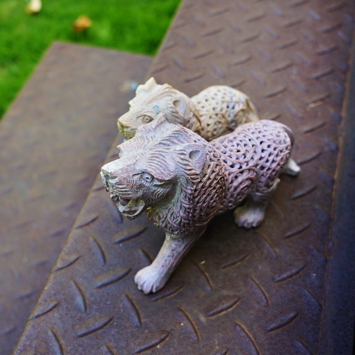 Stone Lion Sculpture with Intricate Jali Carving