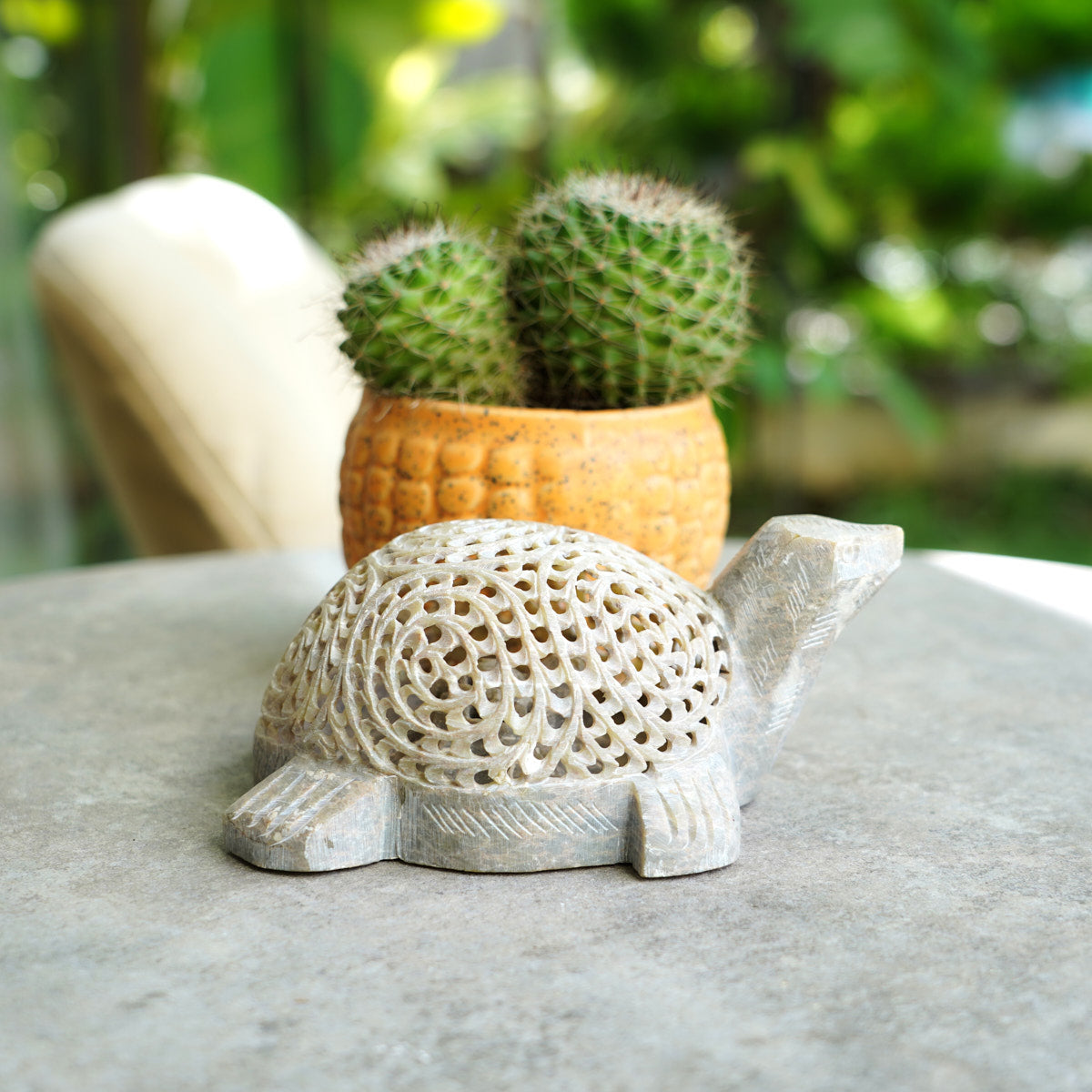 Stone Turtle Sculpture with Intricate Jali Carving