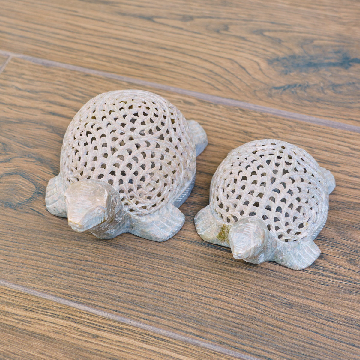 Stone Turtle Sculpture with Intricate Jali Carving